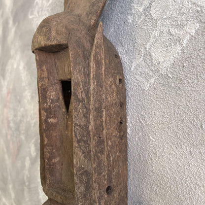 Maschera tribale Dyommo della tribu dei Dogon proveniente dal Mali intagliata a mano su legno XX secolo