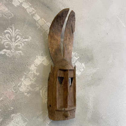 Maschera tribale Dyommo della tribu dei Dogon proveniente dal Mali intagliata a mano su legno XX secolo