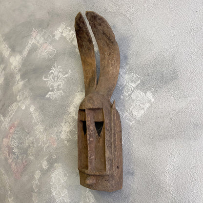 Maschera tribale Dyommo della tribu dei Dogon proveniente dal Mali intagliata a mano su legno XX secolo