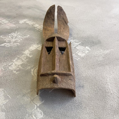 Maschera tribale Dyommo della tribu dei Dogon proveniente dal Mali intagliata a mano su legno XX secolo
