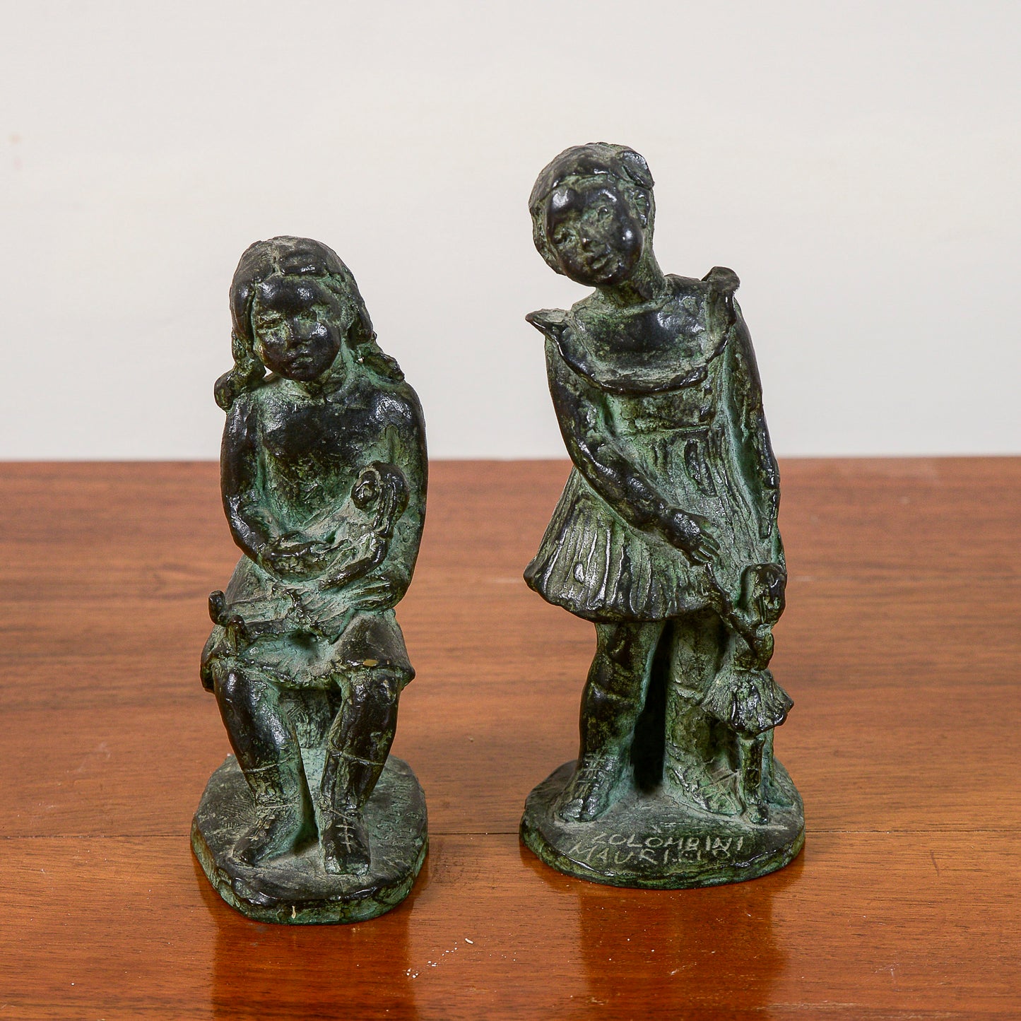coppia di statuine non numerate di colombini