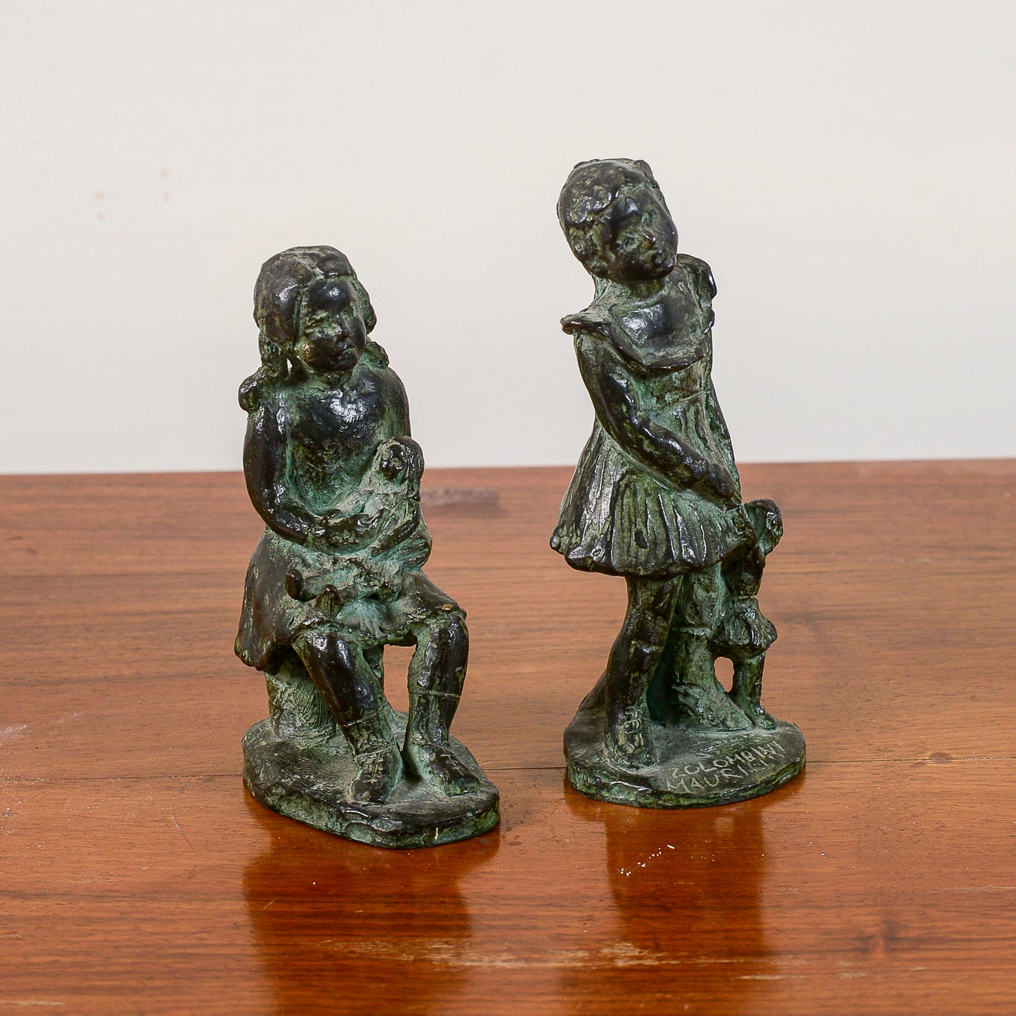 coppia di statuine non numerate di colombini