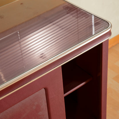 Credenza  Umberto Mascagni  rivestita in vilpelle bordeaux  Italia metà 900
