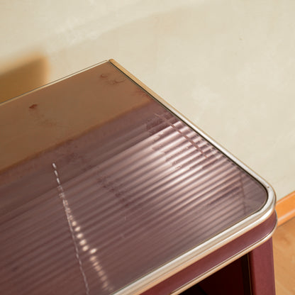 Credenza  Umberto Mascagni  rivestita in vilpelle bordeaux  Italia metà 900