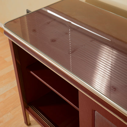 Credenza  Umberto Mascagni  rivestita in vilpelle bordeaux  Italia metà 900