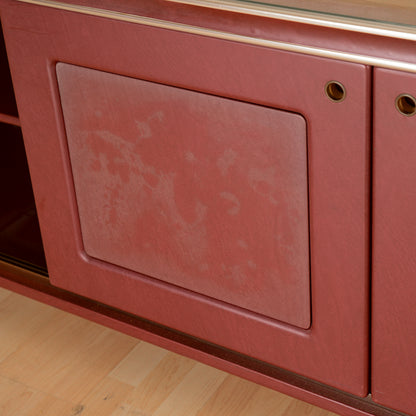 Credenza  Umberto Mascagni  rivestita in vilpelle bordeaux  Italia metà 900