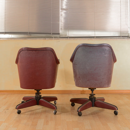 Coppia di  poltrone anni 50 Umberto Mascagni in similpelle bordeaux