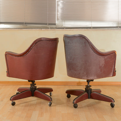 Coppia di  poltrone anni 50 Umberto Mascagni in similpelle bordeaux