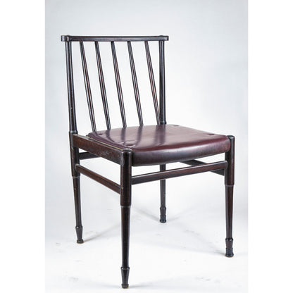 Sedia vintage in legno tinto scuro e similpelle con segni del tempo anni 60