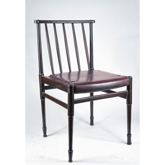 Sedia vintage in legno tinto scuro e similpelle con segni del tempo anni 60