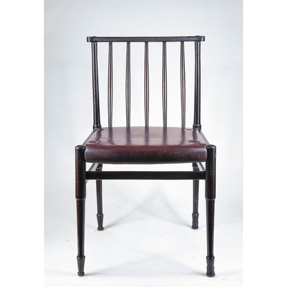 Sedia vintage in legno tinto scuro e similpelle con segni del tempo anni 60