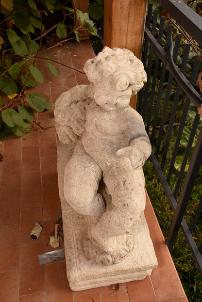 Putto in pietra scolpita Italia epoca fine 800