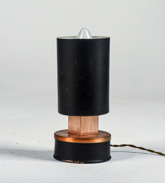 Lampada da tavolo faretto  funzionante metallo verniciato nero e rame  Italia 1970