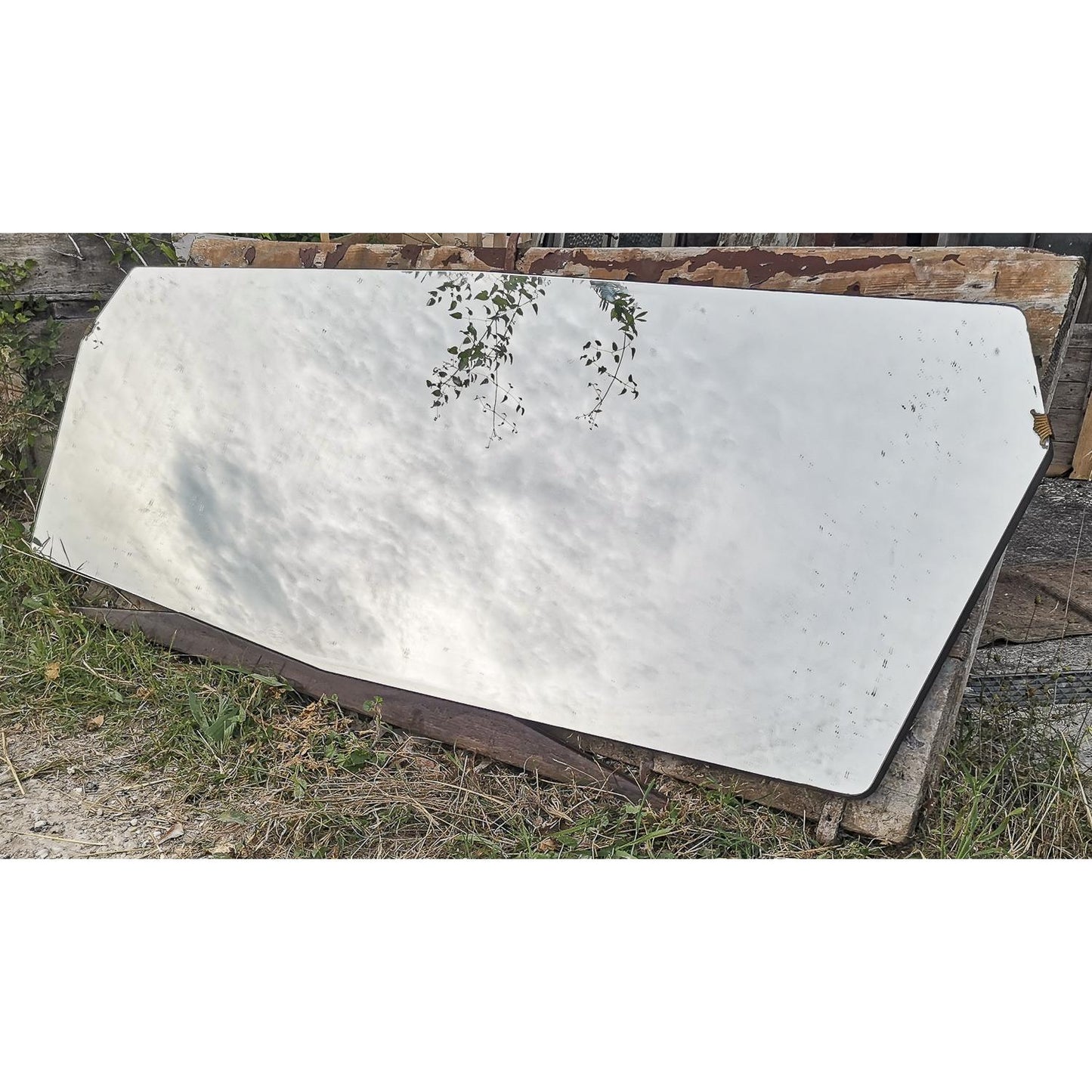 Specchio sagomato Art Deco con base nera in  legno 1940