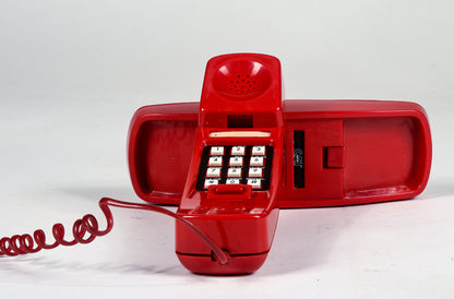 Teleono in plastica rosso da parete o da appoggio della ditta CAT con collegamento tripolare Italia 1980